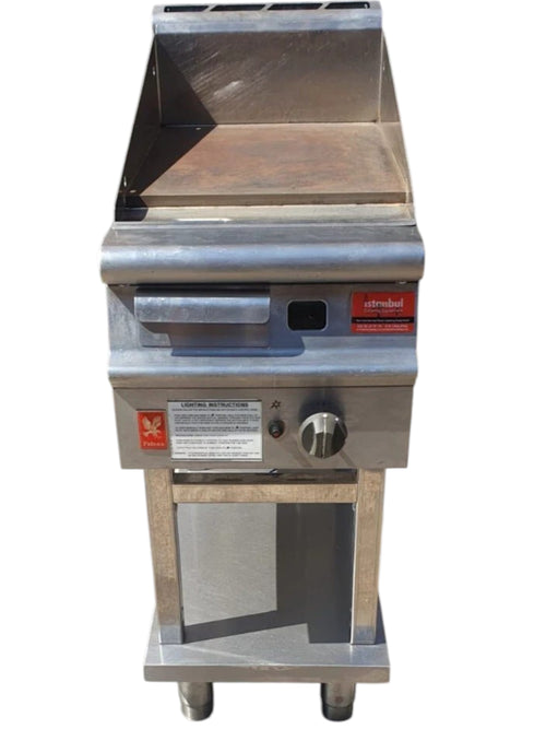 Close-up of the Falcon 40Cm Freestanding Natural Gas Griddle, highlighting its compact size and heavy-duty build for high-volume cooking.