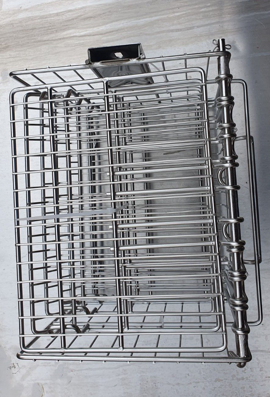 Henny Penny Electric Basket with Hinged Shelves and Legs in a kitchen setting, demonstrating its versatility for cooking various dishes.