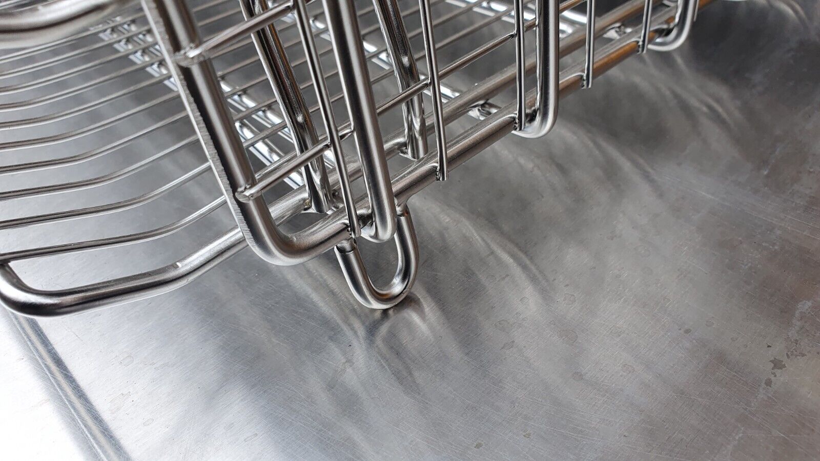 Henny Penny Electric Basket with Hinged Shelves and Legs in action, illustrating its compatibility with Henny Penny Gas Pressure Fryers.