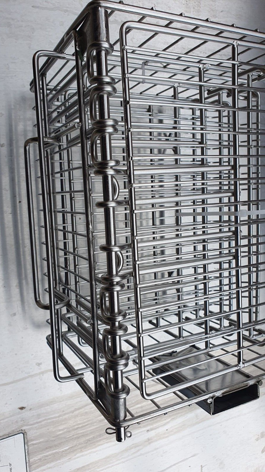 Close-up of the Henny Penny Electric Basket with Hinged Shelves, highlighting the easy access design and removable shelves.