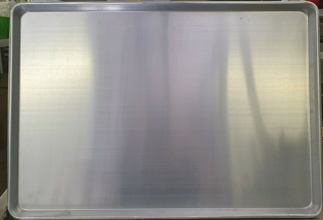 Close-up view of Henny Penny Chicken Tray Sheet Pan 1826 Set of 2 demonstrating its even heat distribution for perfect cooking results.