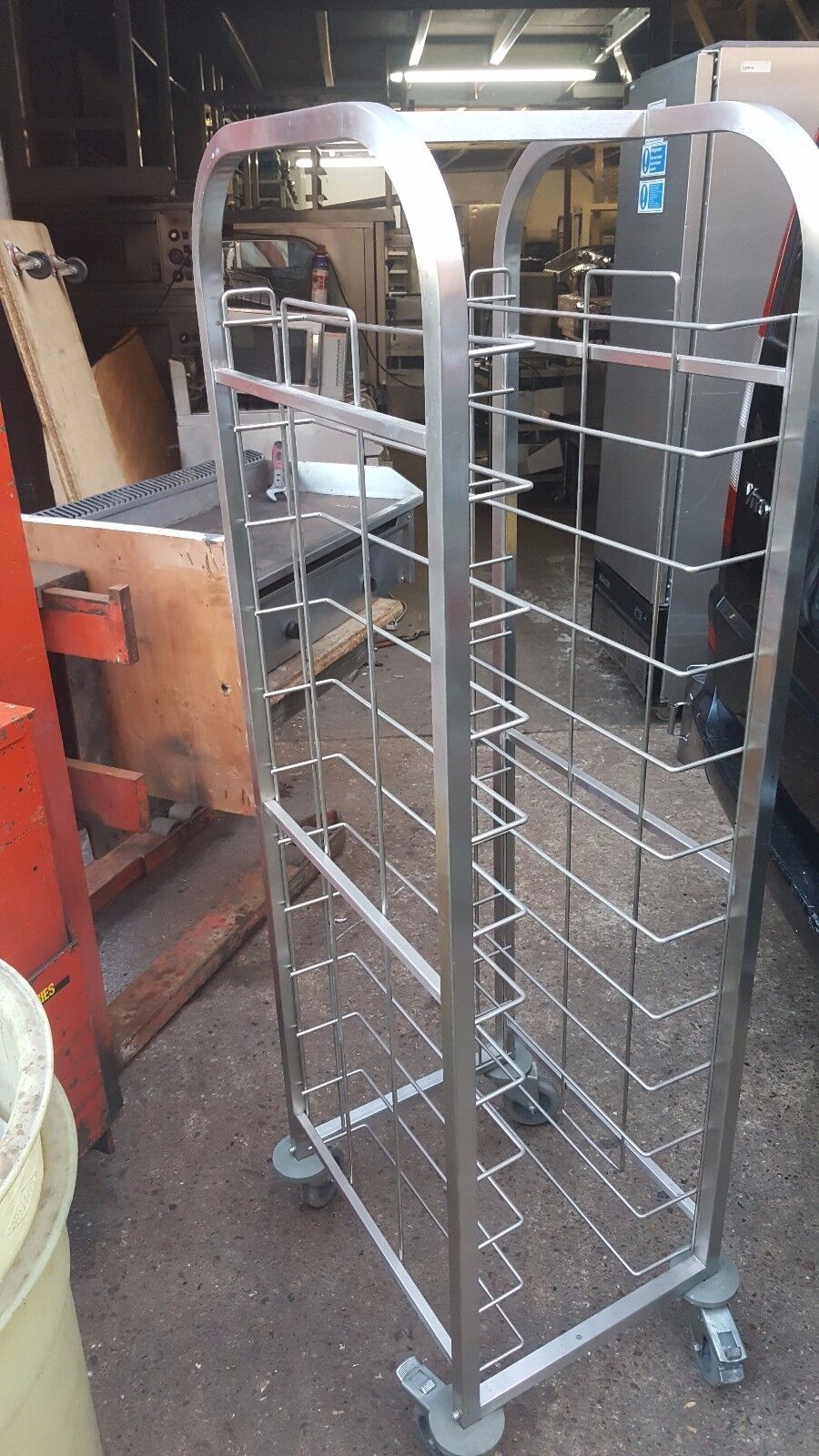 Full view of the Stainless Steel 12 Tray Preparation Trolley Clearing Trolley on Wheels set up for easy access to ingredients and dishes, perfect for kitchen organization.